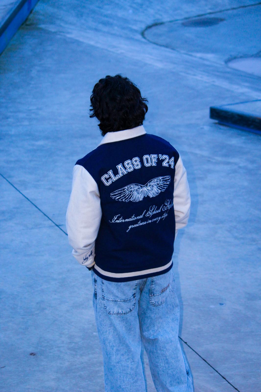Class of '24 varsity jacket back detail — skatepark shoot